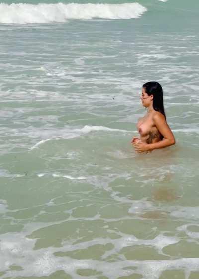 Washing off at the beach