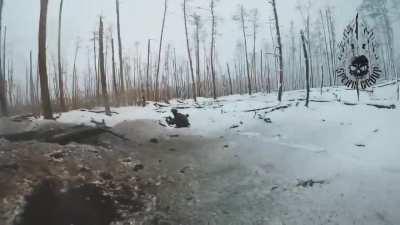 Ukrainian fighters of the Spear Group unit assaulting Russian position in the Serebryansky forest.