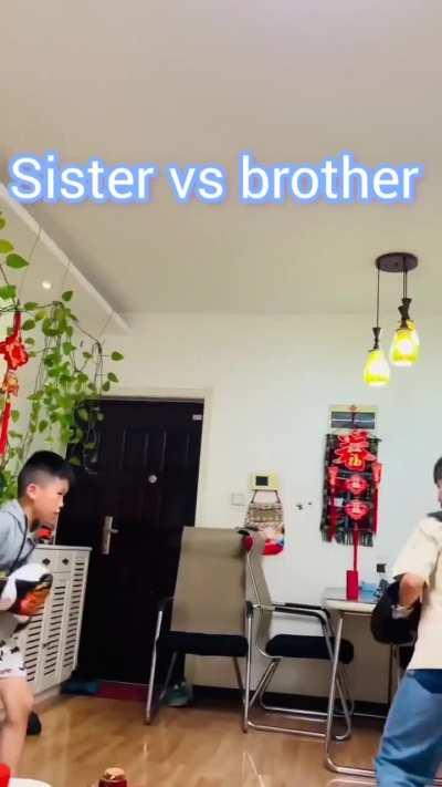 Sanda boxing sparring between brother and sister