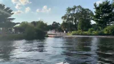 Drunk guy trailers his boat.