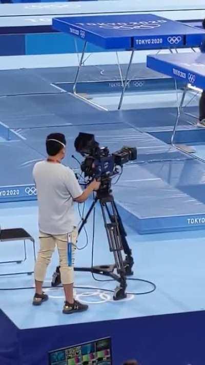 He's filming trampoline gymnastics