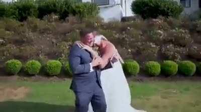 Groom sees his best friend in wedding dress.