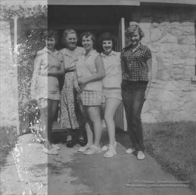 Computer, enhance. «Taken in rural Wisconsin. The woman on the right is my grandma and this would have been the early 1950s. Everyone being gone except my grandma, I always wished she could see it again but assumed it was beyond repair» | restored by me