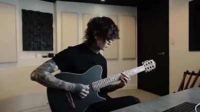 Tim Henson of Polyphia, performing &quot;Playing God&quot; unplugged. 