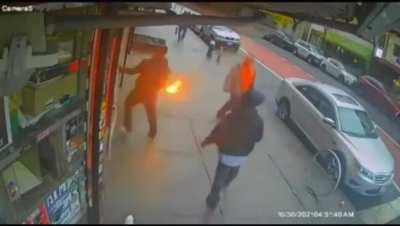 Guy who got kicked out of a deli in New York for being rude came back with Molotov cocktails. A bystander might just have saved their lives.