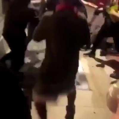 Man tries to reason with a mob destroying his business, gets dragged into the street and beaten.