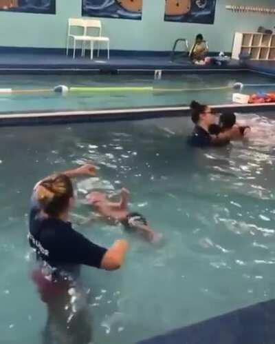 Teaching babies to swim. Human babies naturally hold their breath when underwater