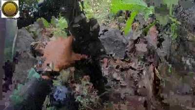 Karenni Nationalities Defense Force and Karenni Army battle against State Administration Council troops in a mountainous area in Karenni State. One dead SAC soldier is seen at the end of the video.