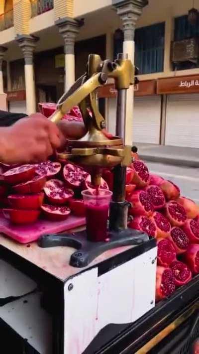 This heavenly elixir of pomegranate juice in the streets of Baghdad, Iraq.