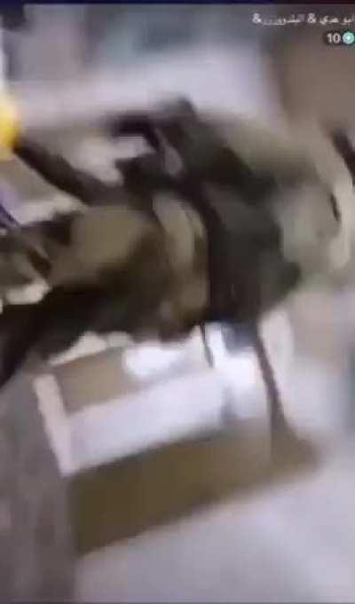 IDF soldiers savagely beat up a Palestinian in his house in Al Khalil, Hebron in the Occupied West Bank and point their gun at his crying young children who were begging the soldiers to stop the beating. The father was taken away by the occupation soldier