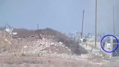 IDF and UN personnel taking cover from mortar shells in Gaza Strip.