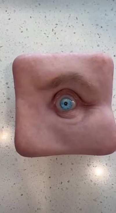 Face on a cube (credit in comments)