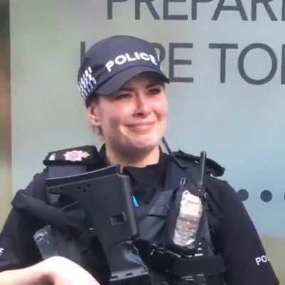 Magician performs magic trick in front of Armed Police...this girl has not forgotten how to be genuinely surprised and admired