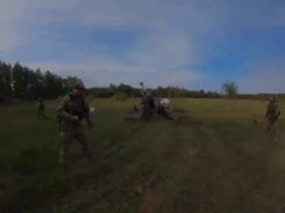 M777 155mm towed howitzer crew operating against Russian target's in the Kharkiv Front. Raven Group, May 2024