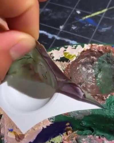 Peeling off dried paint