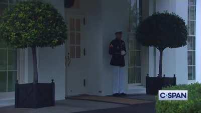 Lightning strikes outside White House as Marine Sentry stands his post