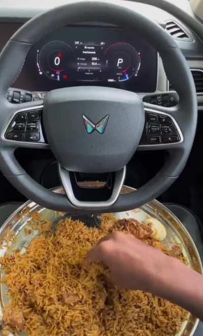 Eating biriyani in a car 