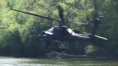 AH-64 Apache flying low over the Cape Fear River