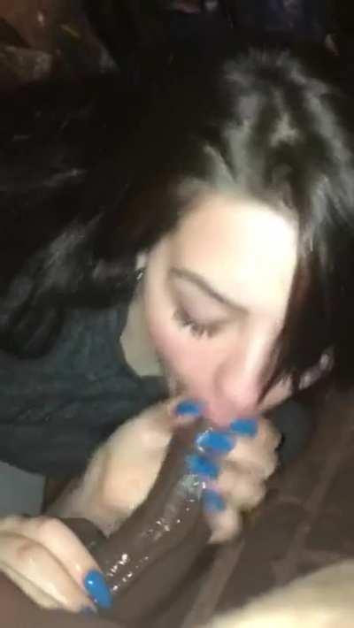 She loves sucking on that black cock