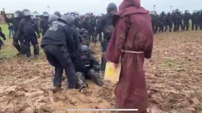 german riot police defeated and humiliated by some kind of mud wizard
