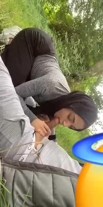 Amateur hijabi teen deepthroating in public park