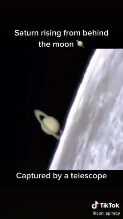 Saturn rising from behind our moon