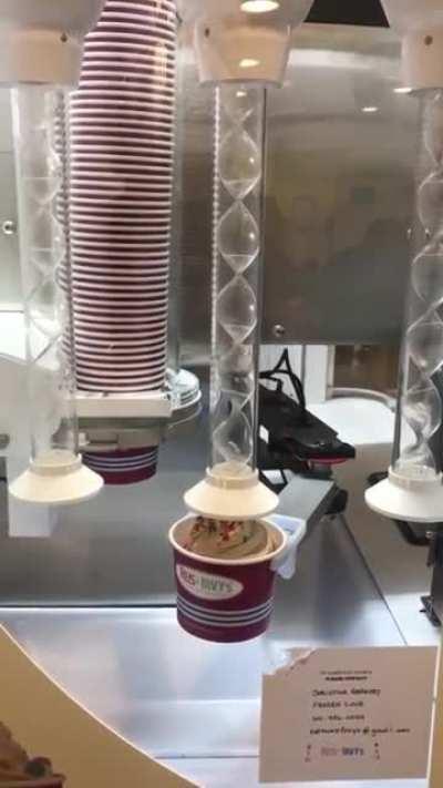 A robot serving ice cream