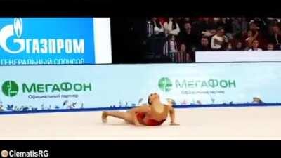 This rhythmic gymnast catches the ball but in an interesting way.