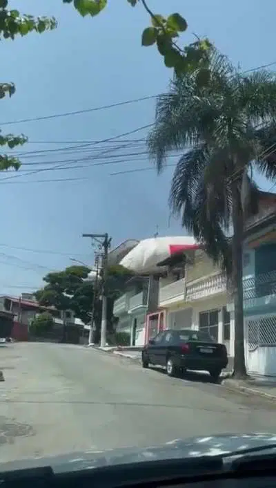 People freak as a zeppelin crashes into their neighborhood in Brazil. 