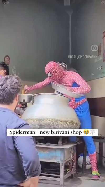 Spiderman serving biryani 