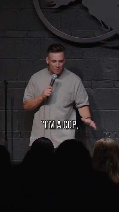 COP in the front row of a comedy show