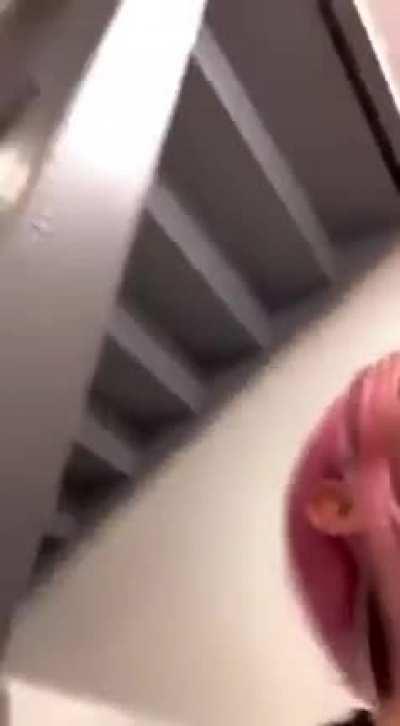 White whore sucks cock in stairwell