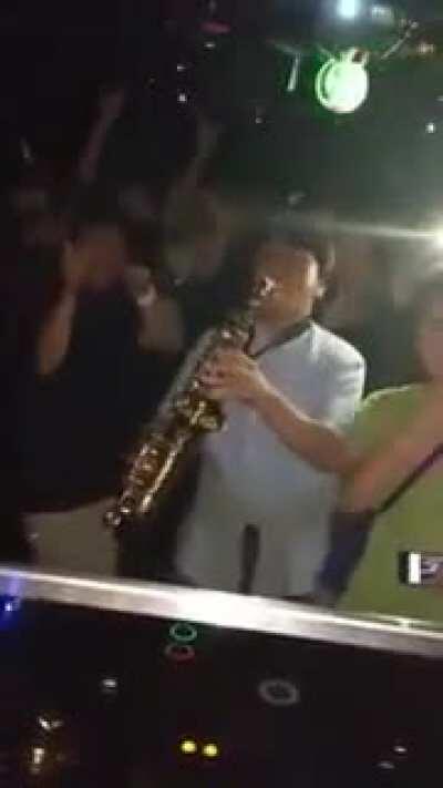 This sax guy in the crowd just stole the show