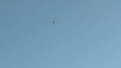 UFO remains stationary even when helicopter comes to check it out (L.A. Aug 2017)