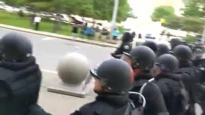 Police officers shove man in Niagara Square to the ground