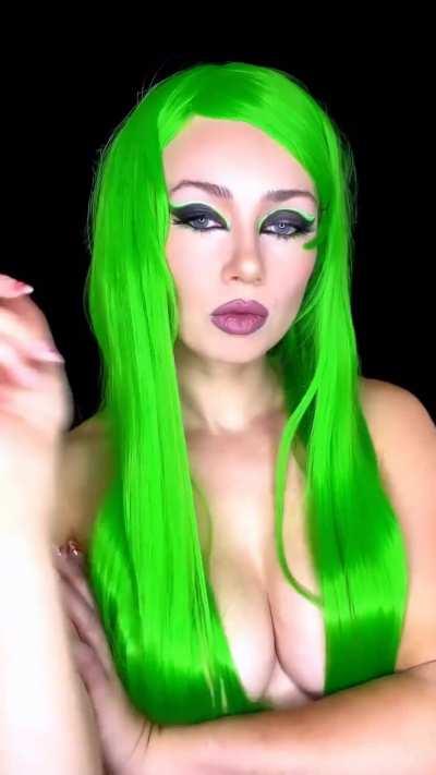Wearing a green wig