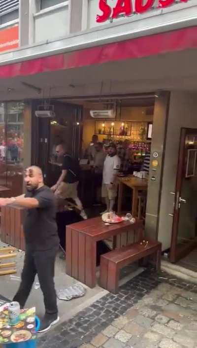 Dutch football fans attacking a pub full of England fans