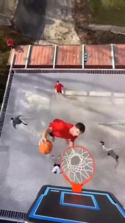 Dunking Basketball By Using a Trampoline