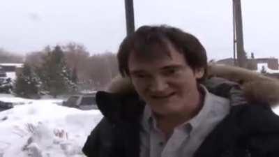 Quentin Tarantino slaps a rude paparazzi.