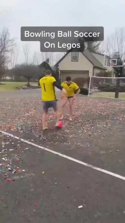 Playing soccer with a bowling ball on Legos