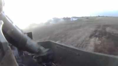 Foreign fighter in Ukraine lighting up Russians with a M2 .50 cal during an assault