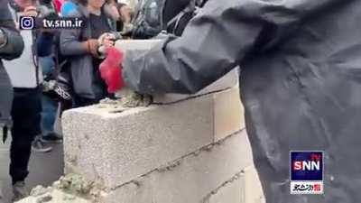 Protesters in France have gone next level and blocked the highway with concrete blocks