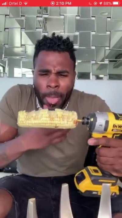 Jason Derulo knocks his teeth out eating corn with a drill on TikTok