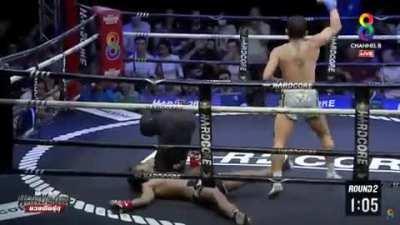 The referee protects the fighter's head from hitting the ground.