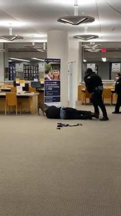 Dog attacks security guard at a library