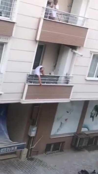 turkish man falls from balcony while fighting