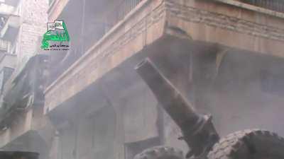 FSA &quot;Hell Cannon&quot; repeatedly batters Syrian Army held buildings in the Salahddine District, Aleppo - 11/23/2014