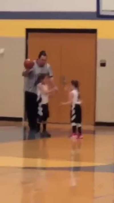 Refereeing both a basketball game and a rock-paper-scissors match to decide who inbounds the ball