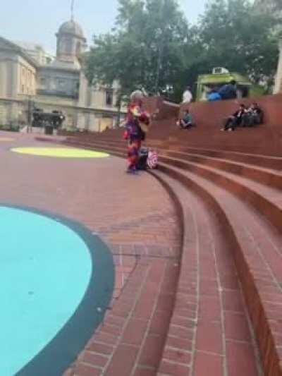 Rainbow Suited Street Musician