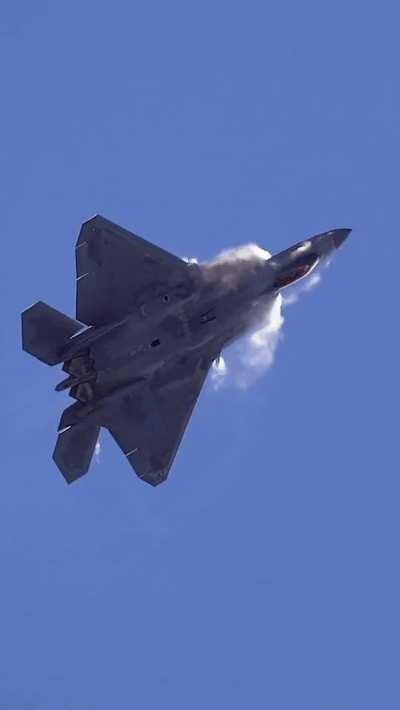 F-22 Raptor doing a Power Loop maneuver.